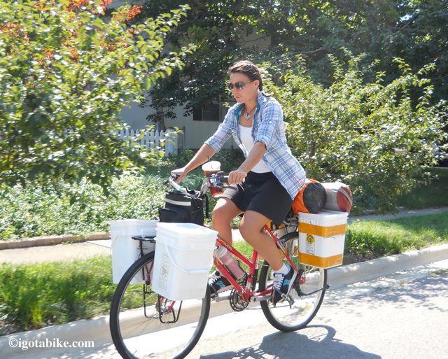 Sarah is pedaling her way from Mississippi to Maine. She says her homemade plastic bucket panniers work great and keep all her stuff dry. They also help to keep the critters out of her food while camping.