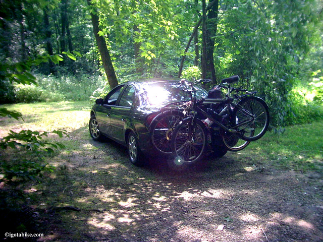 Putting your bike on your car is great way to get started bicycle touring. You can try out long distance riding and an overnight stay. Here we are pulling into our campsite at the Butler KOA. Yes those are fat tire bikes--way back in 2007.