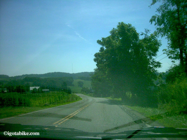 The terrain in north central Ohio is rolling hills to hilly and most roads are narrow. There can also be a traffic jam around some of the more popular Amish towns. Yes, this photo was snapped from inside a car!