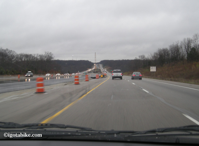 Rare for igotabike.com--here is a view from a car. This is the northbound approach to Jeremiah Morrow Bridges with construction platforms in place in November 2011.